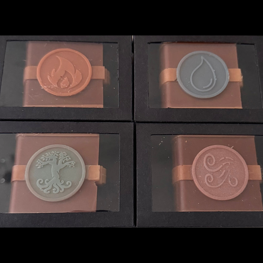 Zodiac Academy The Awakening wax melt set all four elements Fire Air Water Earth in black gift boxes on gold glitter background