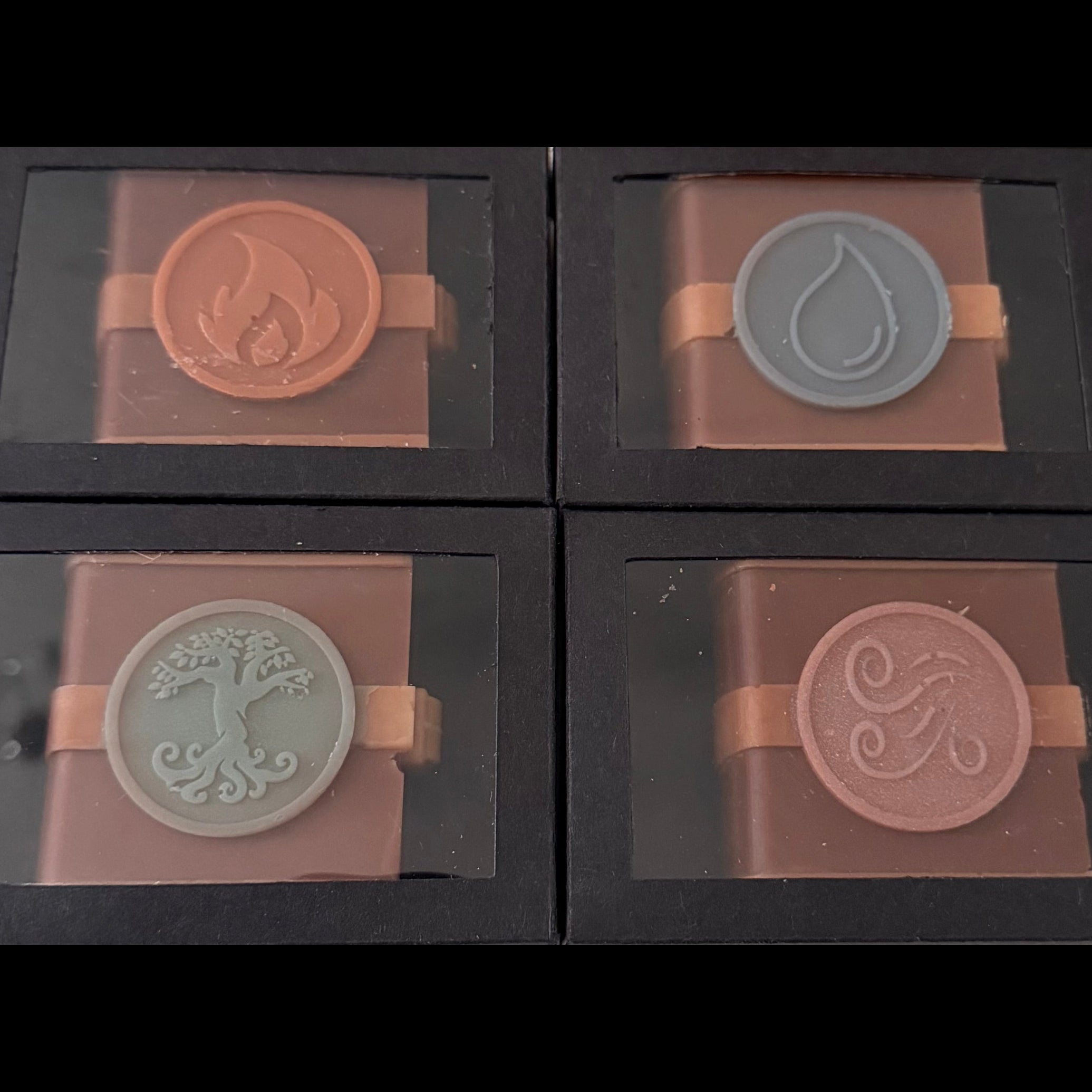 Zodiac Academy The Awakening wax melt set all four elements Fire Air Water Earth in black gift boxes on gold glitter background