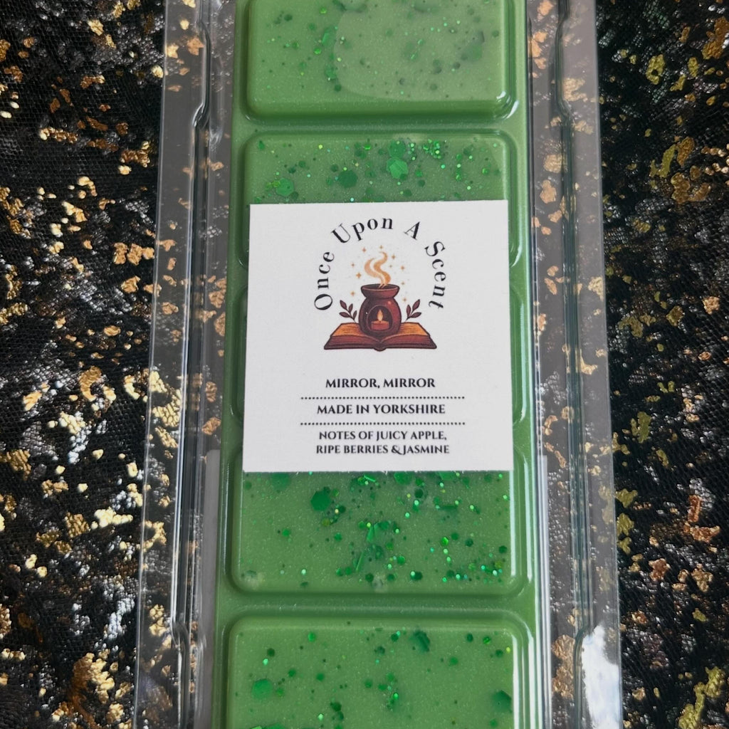 Mirror Mirror green apple fairytale wax melt in a front-facing clamshell showing the Once Upon a Scent label, hand-poured in Yorkshire using high-quality soy wax ensuring a strong tart Granny Smith apple fragrance.


