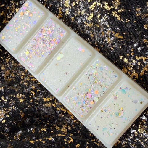 Full five-segment Baby Mine baby powder soy wax melt with a white finish and sparkling iridescent decoration.